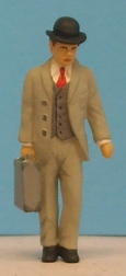 Omen - Man wearing a bowler hat, carrying a suitcase