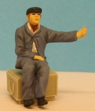 Omen - Seated GWR loco driver, hand on the regulator
