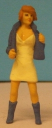 Omen - Girl wearing short dress & boots, holding jacket open