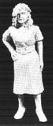Young woman wearing a belted dress